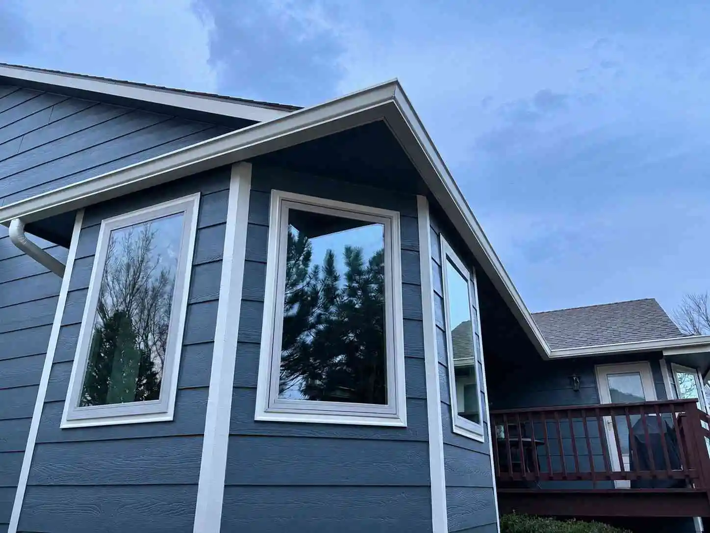 Custom seamless gutter installed along a residential roofline